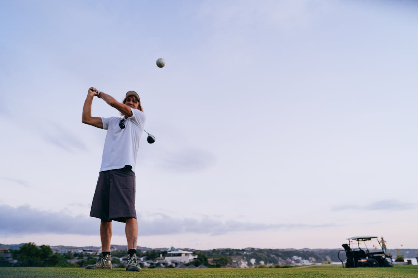 Man enjoying a golf voucher gift